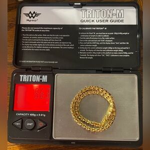 10k yellow gold pink sapphire or tourmaline not really sure which both